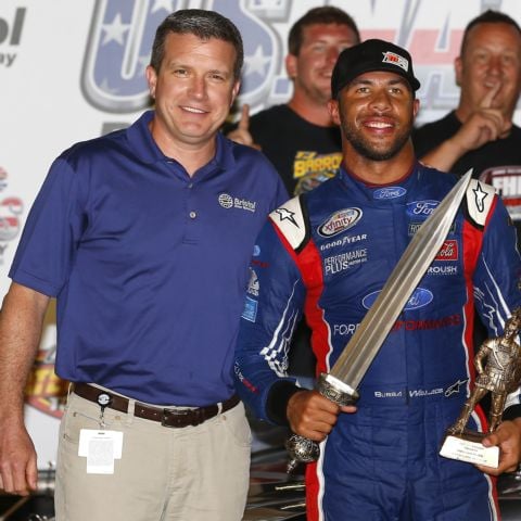 Bubba Wallace (right) won the 2017 U.S. Short Track Nationals at Bristol Motor Speedway and was presented the coveted Gladiator Sword in Victory Lane by track president Jerry Caldwell.