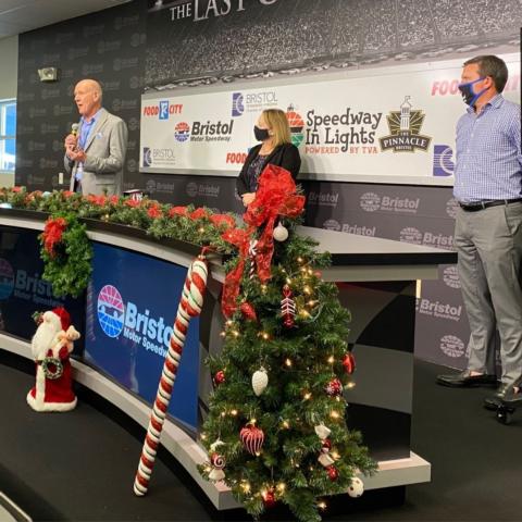 Food City CEO Steve Smith (left), Beth Rhinehart of the Bristol Chamber and BMS general manager Jerry Caldwell announced the details of Operation Bristol Holiday in Lights Friday at a press conference at Bristol Motor Speedway.