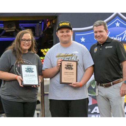 BMS President Jerry Caldwell (right) presented the Dale Jr. Scholarship plaques to 2022 winners Chloe Holman and John Clavier during pre-race ceremonies Saturday.