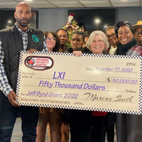 Bristol chapter of Speedway Children's Charities executive director Claudia Byrd (center) presents Johnson City-based LXI with the lucrative Jeff Byrd Grant for 2022 during the annual Night of Smiles in November. The grant is the largest one presented during the evening. All totaled, SCC-Bristol awarded more than $676,000 in grants to more than 70 regional child focused agencies in the Appalachian Highlands region from 2022. Their 2023 fundraising efforts got off to a great start with the winter events at BMS including the Pinnacle Speedway In Lights and the Tri-Cities Airport Ice Rink at BMS presented by Stateline Services.