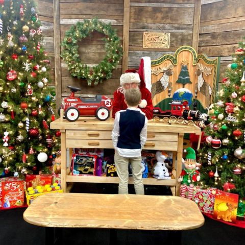 Children can visit with Santa in the Barter Theater Santa Hut inside the Christmas Village presented by Food City during their visit to the Pinnacle Speedway In Lights at BMS.