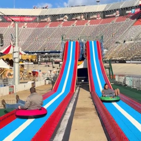 The popular Eastman Credit Union Mega Slide returns to the midway in the Food City Speedway In Lights HSN Christmas Village.