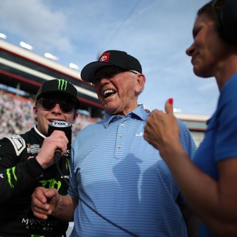 Ty Gibbs (left) shares a special moment with his grandfather and team owner Joe Gibbs during an interview with FOX Sports' Jamie Little after Ty won the Food City 500 at Bristol Motor Speedway.