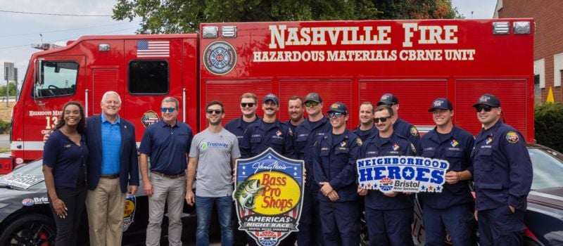BMS President Jerry Caldwell (third from left) and NASCAR star Daniel Suarez take a photo with the BMS Neighborhood Heroes from Fire station No. 13 in Nashville who will be honored Saturday, Sept. 19.