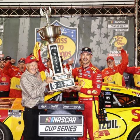 Bass Pro Shops owner Johnny Morris (left) celebrates with Joey Logano, who won America's Night Race Saturday night under the lights at Bristol Motor Speedway.