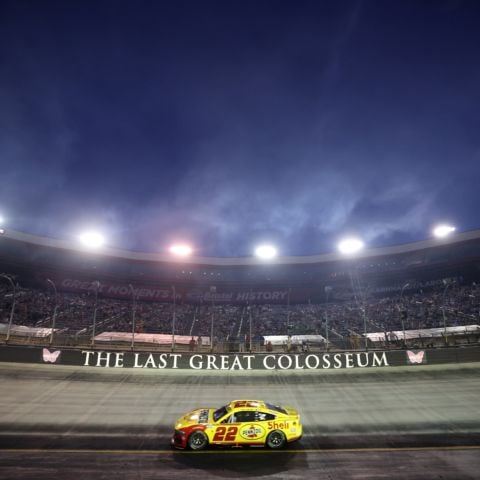 Joey Logano (22) started from the outside front row and slipped through some chaos at the end of the race with seven laps to go to take his fourth career Bristol Cup Series victory.