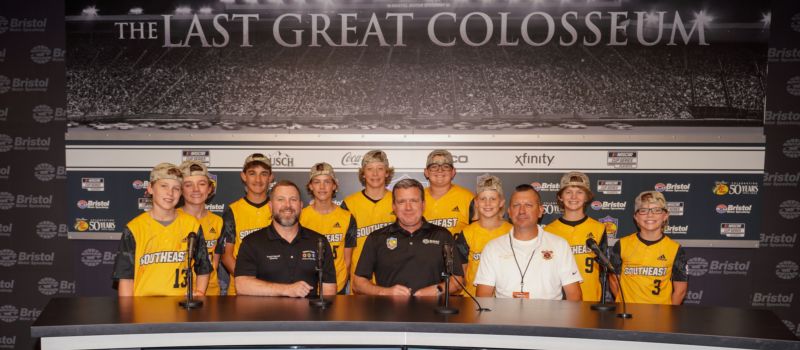 The 2022 BMS Neighborhood Heroes gathered for a group photo in the Media Center prior to pre-race ceremonies Saturday.