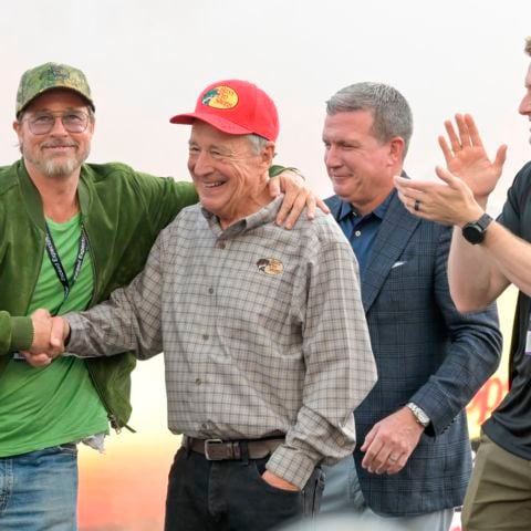 From left, Brad Pitt, Johnny Morris, BMS President and General Manager Jerry Caldwell and Josef Newgarden share a moment on stage during pre-race ceremonies.