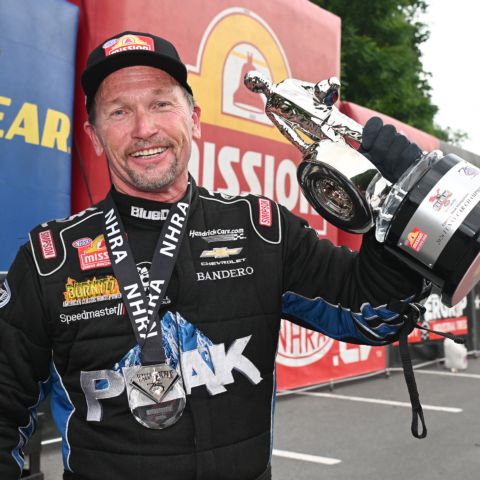 Jack Beckman won the delayed Funny Car finals of the NHRA New England Nationals Friday night at Bristol Dragway in Tennessee.