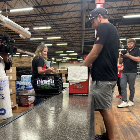 Chase Briscoe helped God's Pit Crew team members pack one of their signature "Blessing Buckets" which go out immediately to those in need during natural disasters.