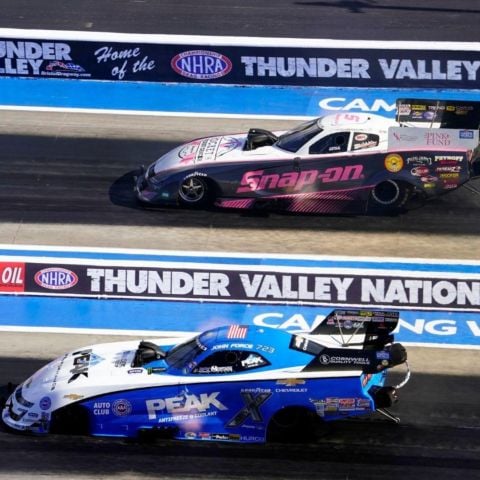 John Force (near lane) won four times at historic Bristol Dragway in NHRA Funny Car competition.