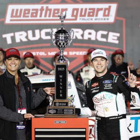 Chandler Smith (right) celebrates with WEATHER GUARD executive Stacy Gardella in Victory Lane Friday night at Bristol Motor Speedway.