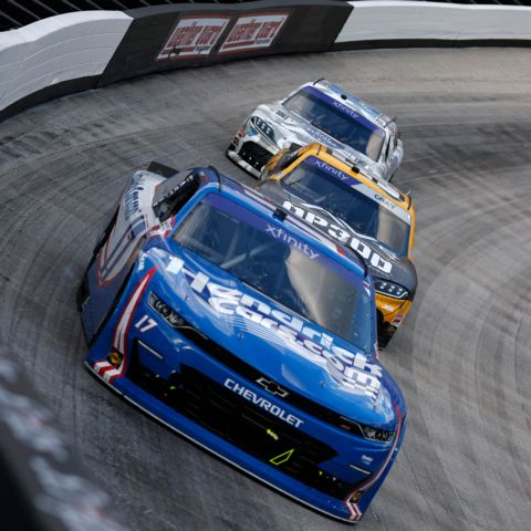 Kyle Larson pilots his No. 17 Chevrolet up against the wall while leading the SciApps 300 at Bristol Motor Speedway Saturday at Bristol Motor Speedway.