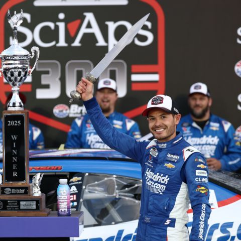 Kyle Larson celebrates in Victory Lane with the iconic Bristol Motor Speedway gladiator sword after his victory in the SciAps 300 NASCAR Xfinity Series race Saturday.