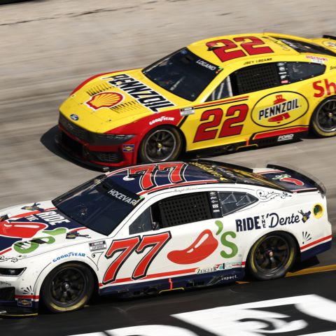 Carson Hocevar (77) has one of the new numbers fans are following this season, while established star Joey Logano pursues in the history-rich No. 22 machine.