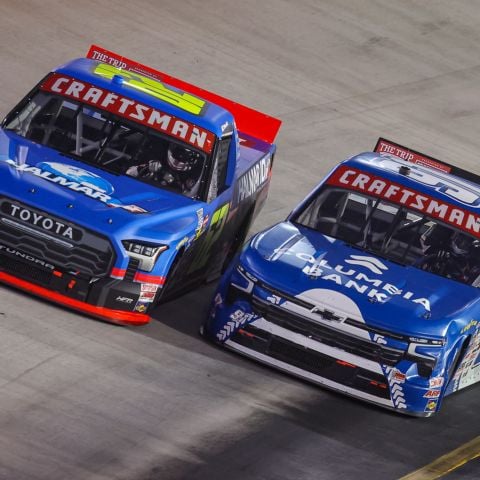 Christopher Bell (62) and Christian Eckes (91) battle for the lead late in the Tennessee Army National Guard 250 Friday at Bristol Motor Speedway.