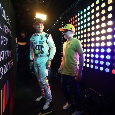 Ty Gibbs (left) walked out with Brexton Busch to "All the Small Things" by Blink 182. Gibbs is running a tribute M&Ms paint scheme to honor the late Kyle Busch.