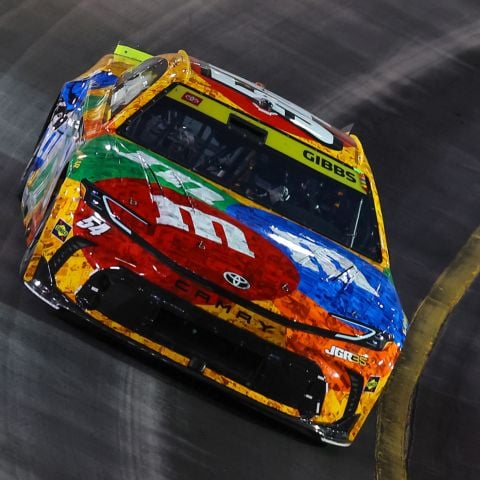 Ty Gibbs makes a lap in the No. 54 yellow M&M's tribute paint scheme to the late Kyle Busch.