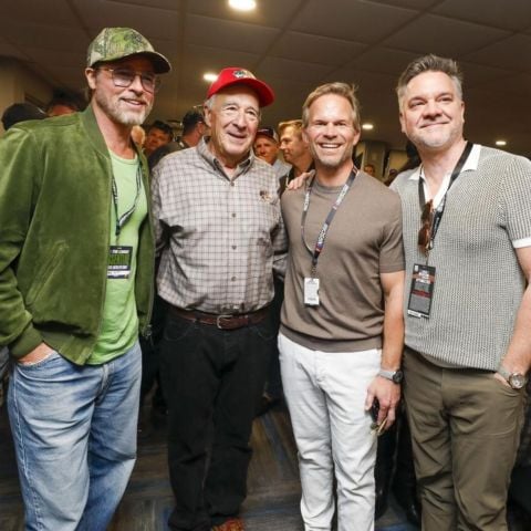 Speedway Motorsports CEO Marcus Smith (center, second from right) welcomed the Grand Marshals, Brad Pitt (left) and Johnny Morris (to Smith's right) during the driver's meeting.
