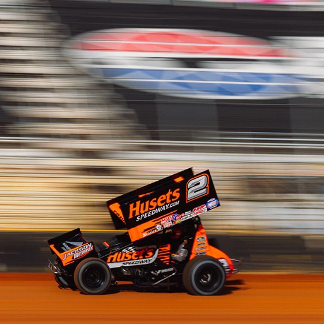 Sprint car driver Donny Schatz, right, of Fargo, N.D., battles for