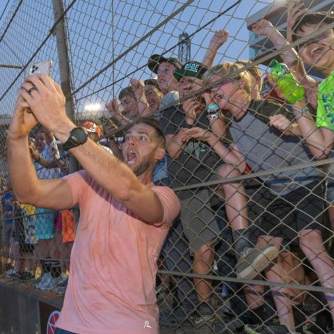 Cody Jones, aka "The Tall Guy" poses for a selfie with fans Friday at BMS during the Dude Perfect show.