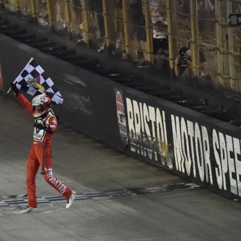 Kyle Larson captured the checkered flag for the first time at Bristol Motor Speedway Saturday adding his name to the winner's list of the iconic Bass Pro Shops NRA Night Race.