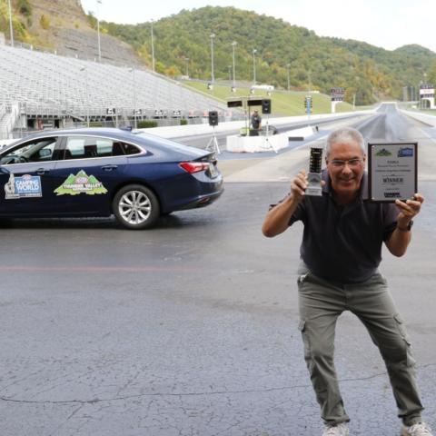 Veteran photojournalist Earl Neikirk scored the win in the NHRA Thunder Valley Nationals Celebrity Drag Race Challenge Wednesday afternoon at historic Bristol Dragway. 