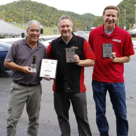 The award earners from the NHRA Thunder Valley Nationals Celebrity Drag Race Challenge included (left-right) winner Earl Neikirk, a veteran photojournalist, runner-up Dave Dobson from the TV show Motorhead Garage and WCYB meteorologist Ricky Matthews, who posted the fastest speed of the event. 