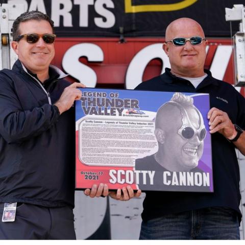 Jerry Caldwell, executive vice president and general manager of Bristol Motor Speedway & Dragway (left) presented Legend of Thunder Valley inductee Scotty Cannon with the plaque during pre-race ceremonies during the NHRA Thunder Valley Nationals.