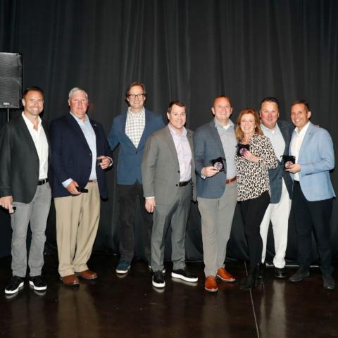 BMS Sr. Business Development Executive Janet Callahan (third from right) was named one of Speedway Motorsports top sales performers in 2021 during a company awards presentation this week in Nashville.