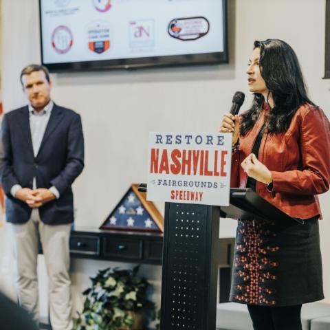 Martha Silva from Conexion Americas addresses the luncheon group today in Nashville as BMS introduced six community benefits partners as part of its proposed revitalization plan for the historic Nashville Fairgrounds Speedway.