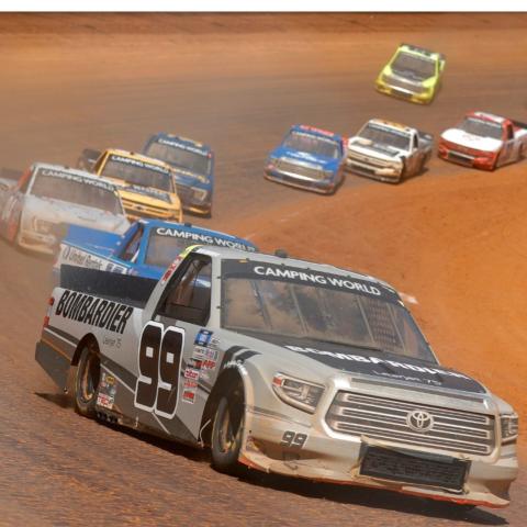 Defending Camping World Truck Series champ Ben Rhodes (99) finished second in the Pinty's Truck Race on Dirt last season and is looking to improve that spot by one this year at Bristol Motor Speedway. 