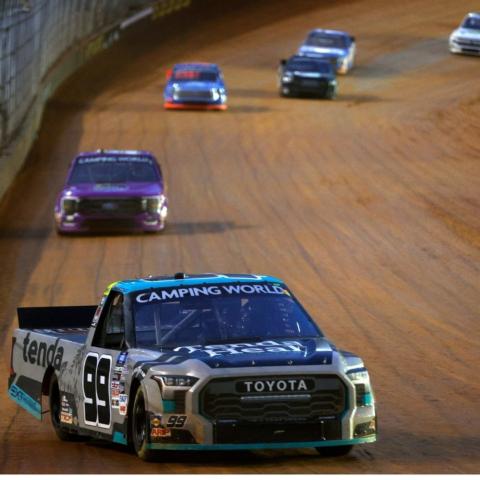 Defending Camping World Truck Series champ Ben Rhodes (99) raced to victory Saturday night in the Pinty's Truck Race on Dirt at Bristol Motor Speedway.