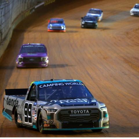 Defending Camping World Truck Series champ Ben Rhodes (99) raced to victory Saturday night in the Pinty's Truck Race on Dirt at Bristol Motor Speedway.