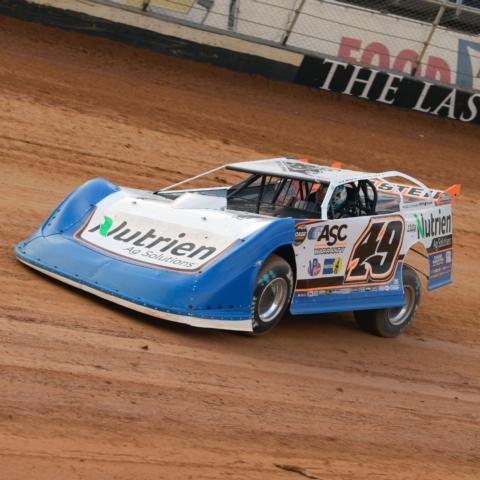 Jonathan Davenport earned the $25,000 victory in the World of Outlaws CASE Construction Equipment Late Model Series Friday night at Bristol Motor Speedway in the World of Outlaws Bristol Bash. 