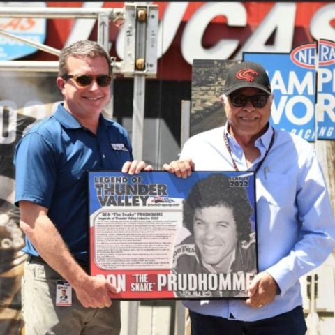 Bristol Dragway President Jerry Caldwell presents the Legend of Thunder Valley plaque to Don "The Snake" Prudhomme to officially induct him into the historic track's hall of fame.