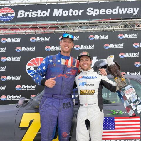 Cleetus McFarland congratulates Brad DeBerti for winning the Bristol 1000.