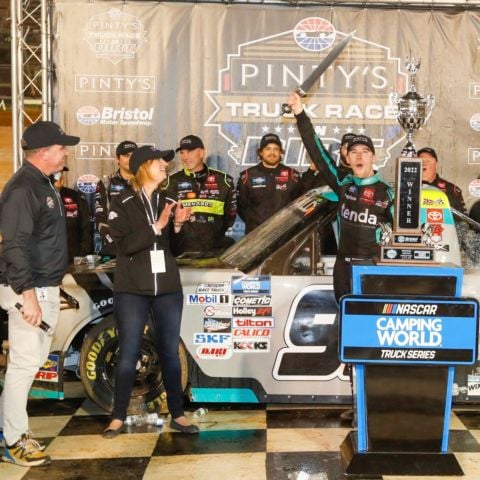 Prior to winning last year's NASCAR Craftsman Truck Series dirt race at BMS, Ben Rhodes had already said he prefers the Bristol Dirt configuration to the Bristol Concrete setup. In this photo he celebrates by raising the coveted BMS Gladiator Sword after taking the hard-earned victory.