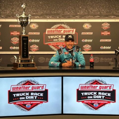 Joey Logano talks to media members in the Bristol Motor Speedway media center after winning Saturday's WEATHER GUARD Truck Race on Dirt.