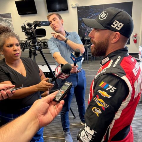 Ross Chastain (right) speaks to media members Tuesday during a Goodyear Tire test at Bristol Motor Speedway.