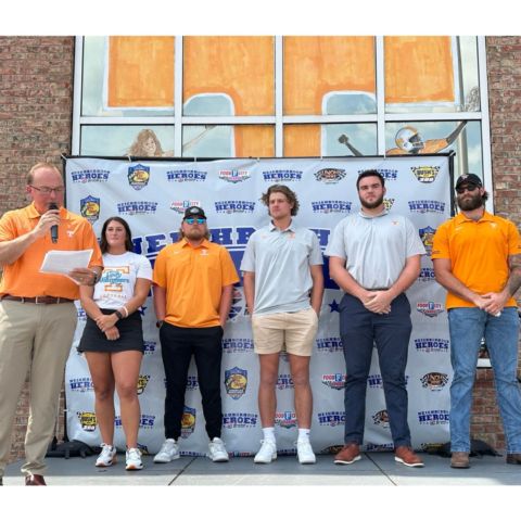 Bristol Motor Speedway officials announced its Knoxville area Neighborhood Heroes, the University of Tennessee Athletics Dept and five of its student-athletes, today during a news conference at the Food City at Western Ave. From left to right: Dr. Jerry Punch, emcee; Camryn Sarvis, UT Softball, Kirby Connell, UT Baseball; Colby Backus, UT Baseball; Dane Davis, UT Football; and Austin Lewis, UT Football.