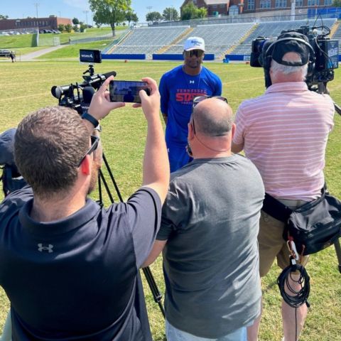 Tennessee State head football coach Eddie George meets with media members following the announcement that he was named a BMS Neighborhood Hero for the Nashville region this morning following his team's practice session at historic Hale Field.