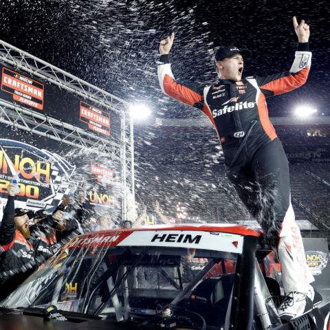 Corey Heim celebrates in Bristol's elevated Victory Lane Thursday after winning the UNOH 200 presented by Ohio Logistics.