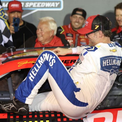 Justin Allgaier's team owner Dale Earnhardt Jr. climbed aboard his Chevy as it drove up the ramp to Bristol Motor Speedway's Victory Lane to celebrate Allgaier's Food City 300 victory.