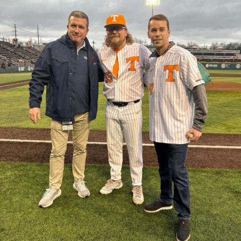 From left to right, Bristol Motor Speedway President and GM Jerry Caldwell, Tennessee Vols relief pitcher Kirby Connell and NASCAR Craftsman Truck Series star Ben Rhodes pose for a photo after Rhodes performed the ceremonial first pitch for Wednesday's game in Knoxville.