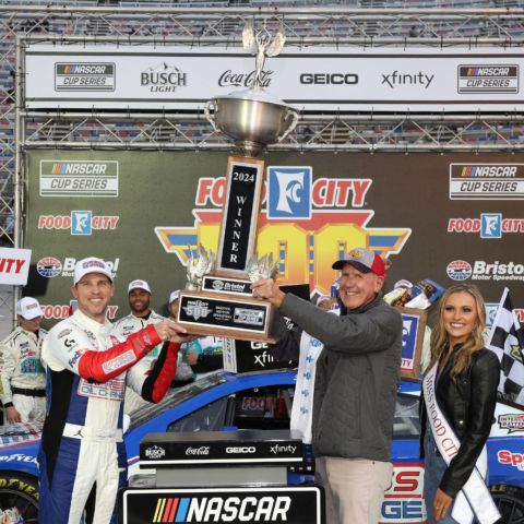 Denny Hamlin won his fourth Bristol Motor Speedway Cup race, and first-ever Food City 500 on Sunday. He and Steven C. Smith, CEO and President of Food City celebrate in Victory Lane by lifting the iconic BMS winner's trophy.