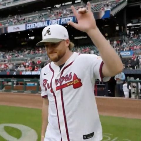 Ty Dillon waves to fans at Truist Park before his first pitch at the Braves-Reds game on May 7.