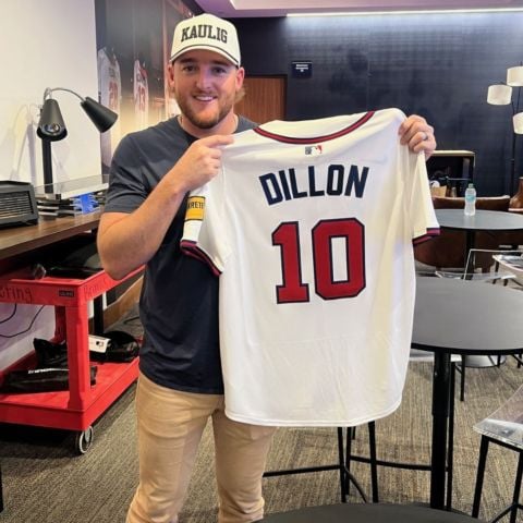 Ty Dillon shows off his custom Braves jersey before his ceremonial first pitch at the Braves-Reds game on May 7th.