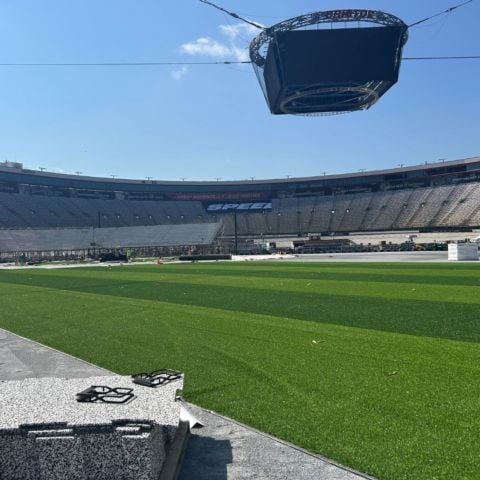 The turf is being installed this week for the MLB Speedway Classic.