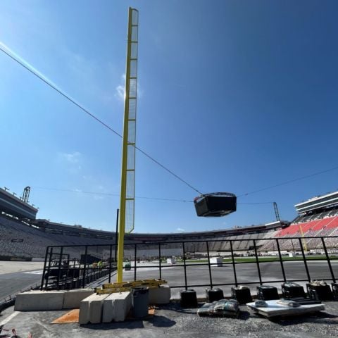 The right field foul pole as seen from beyond the field.